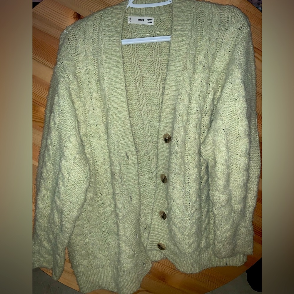 The Bay MNG cable knit button up sweater.